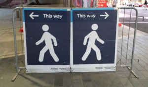 Sign with two directions